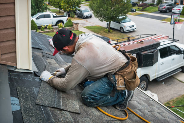Professional Roofing technician working in Columbus, IN